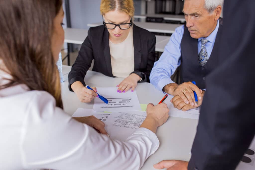 Three people discussing probate