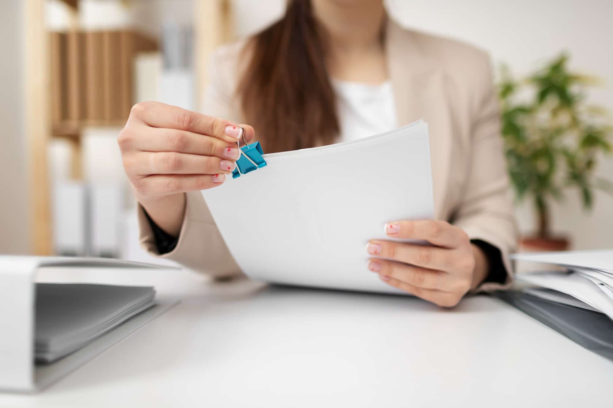 Woman holding documents