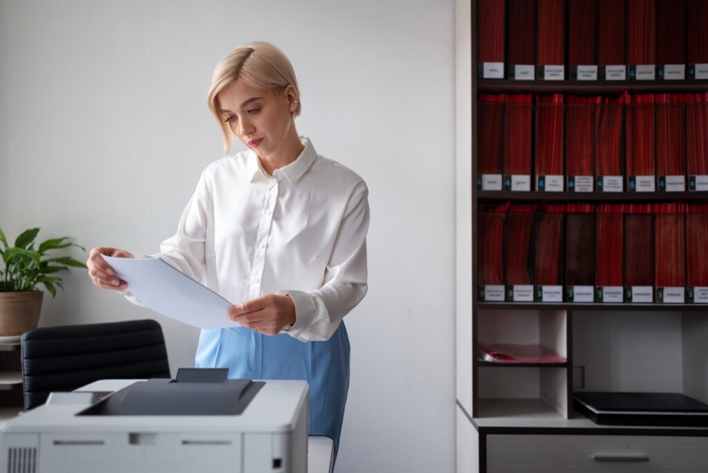 woman looking at financial documents